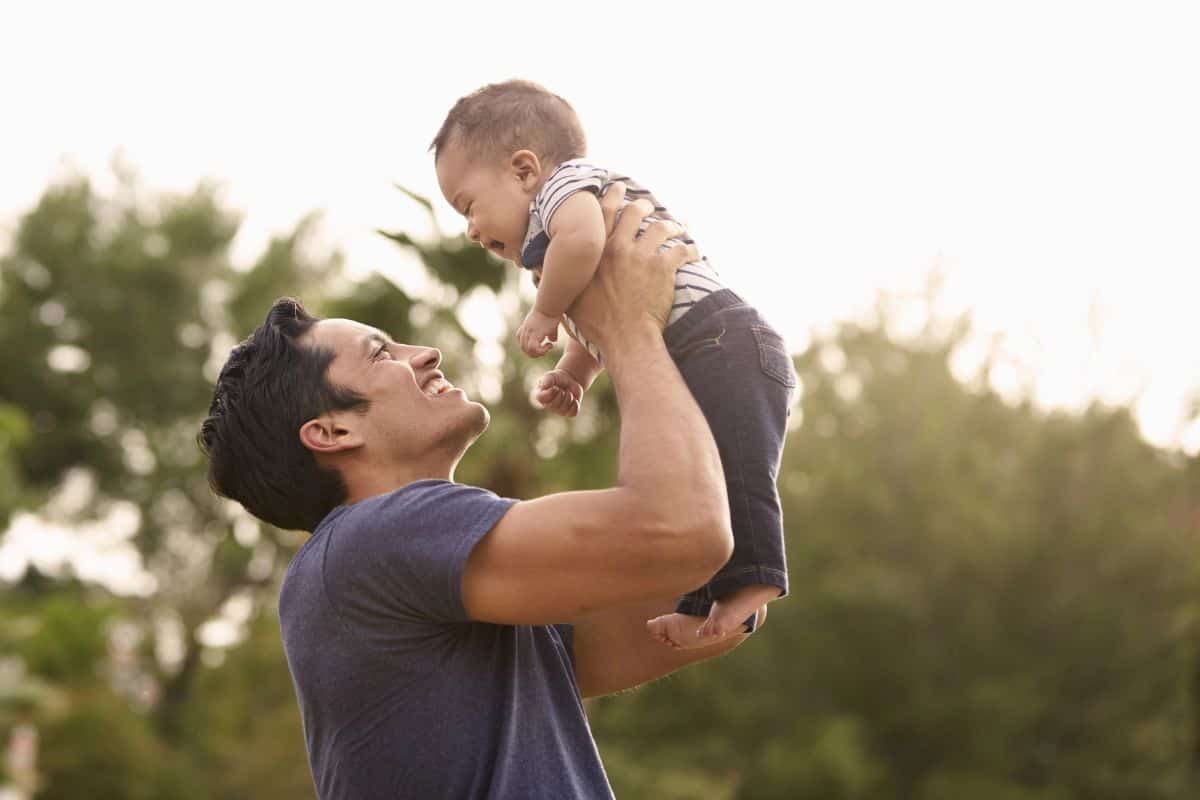 Father and baby in the park